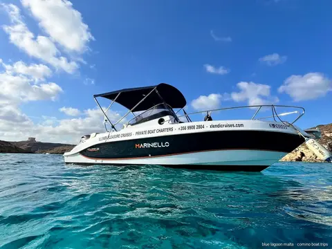 Private speedboat crossing the channel between Comino and Gozo